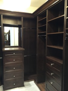 Wilmette. The master drawers are in a solid wood with a shaker ogee style face. The other room is Euro Slab doors with a solid wood face 1