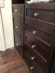 Wilmette. The master drawers are in a solid wood with a shaker ogee style face. The other room is Euro Slab doors with a solid wood face 3